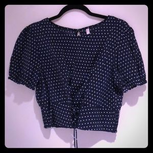 Navy and white polka dot top